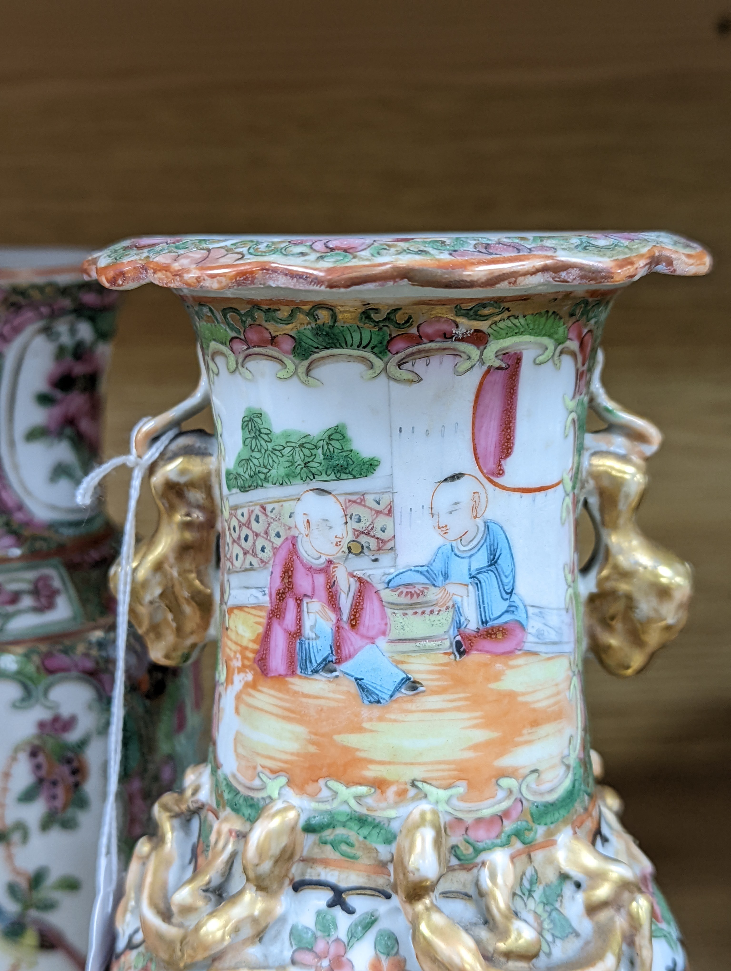 Two Chinese famille rose vases, late 19th century, tallest 26 cm, one wood stand, some restoration